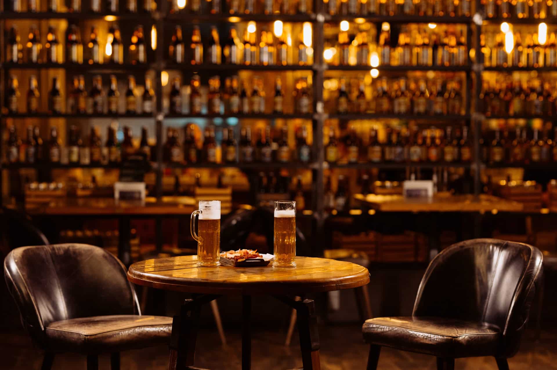 Pub interior with pint glasses on table